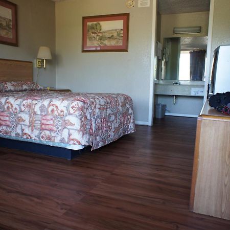 Executive Inn & Suites Orange Habitación foto
