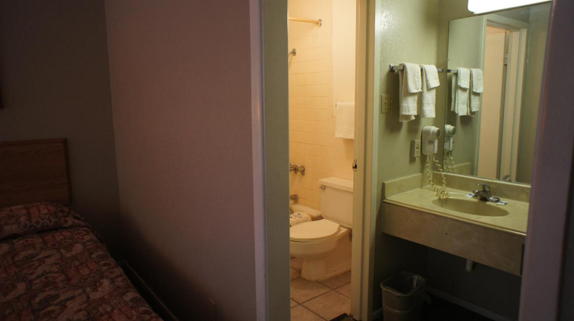 Executive Inn & Suites Orange Habitación foto