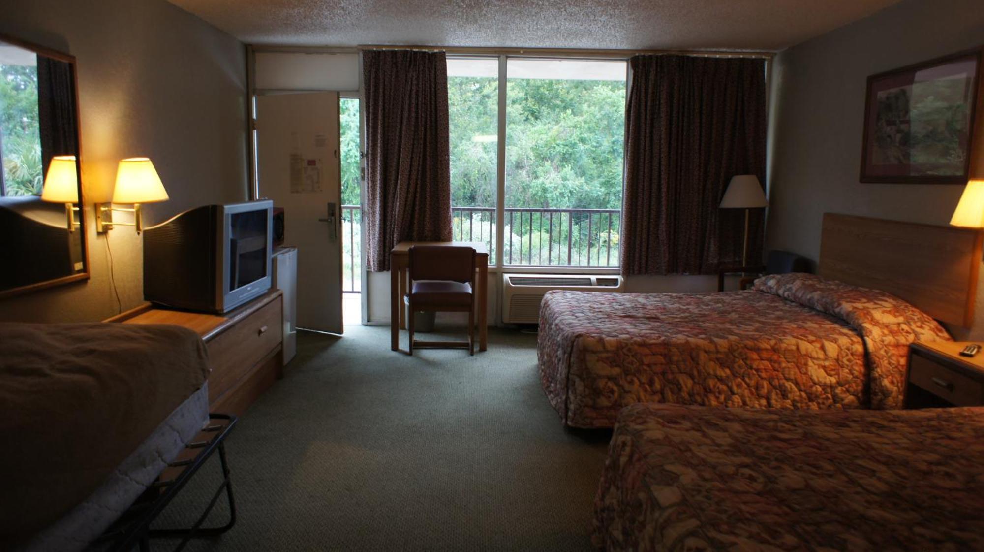 Executive Inn & Suites Orange Habitación foto