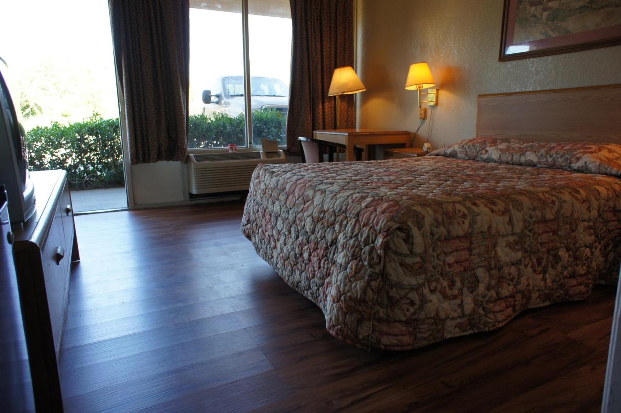 Executive Inn & Suites Orange Habitación foto