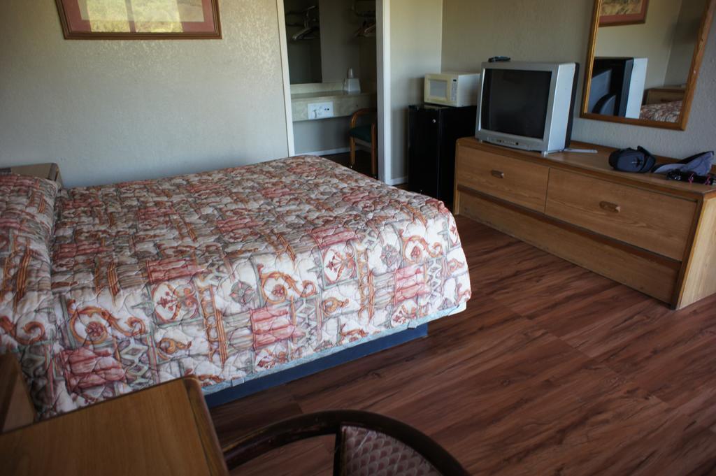 Executive Inn & Suites Orange Habitación foto